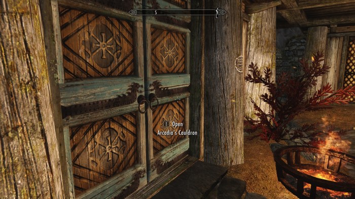 Some vandal has defaced Arcadia's door-post with gang symbols. Bet it was Braith.