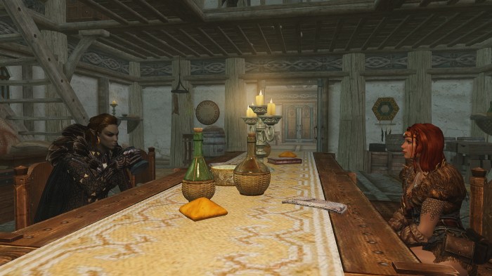 Look, the table can support three bottles of wine! Three! And a big candlestick to boot!